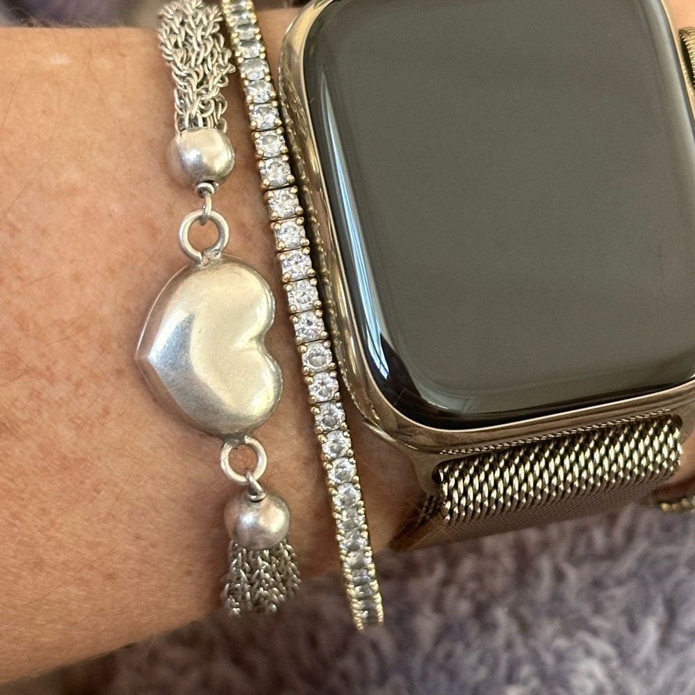 Silver heart bracelet.